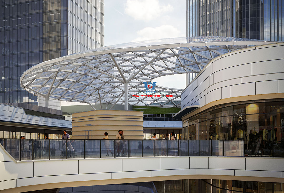 Recently, Shaoxing Huafa Financial Vitality City ETFE membrane structure commercial canopy ushered in new progress.  Shaoxing Huafa Financial Vitality City is located in Jinghu New District, Yuecheng District, Shaoxing City, 7.5km away from Shaoxing City Center, east to Xingzhong Road, west to Wenxian Road, south to Qunxian Road, north to Kwun Tong Road West. Huafa Financial Vitality City is the first commercial flagship brand of Guomai Huafa into Zhejiang, based on the history and future of Shaoxing, located in Jinghu high-end core, to create a construction surface of about 70,000 square meters of MALL BLOCK commercial street combination of urban creative consumption space. The vertical support system of the main steel structure of the canopy is a tree structure, the horizontal support system is a double-curved box lattice shell structure, and the steel columns and diagonal braces are all hoisted in a single hoisting mode. The roof lattice shell is assembled in blocks by automobile crane on the ground, and the crawler crane is hoisted in blocks. Finally, it is covered with ETFE film (soft glass). Make the whole commercial street more transparent and bright, dazzling.   The steel structure installation and splicing work is being carried out at the site. Due to the narrow space, the steel structure hoisting operation radius is large, and the on-site welding amount is large, and the recent attacks of high temperature and heavy rain have brought many tests to the project. According to the actual working conditions on the site, Marriott disassembled the steel structure hoisting section and calculated the hoisting equipment; And according to the actual situation of the project to organize relevant technical personnel to carry out targeted learning and understanding, multiple training. Establish BIM model to guide factory processing and on-site installation, adopt high-precision laser cutting, organize processing personnel and construction personnel to disclose information in special meetings, fully understand drawings and models, and provide a strong guarantee for project construction. Engineering quality is the control focus of each project, and this project is included in the company's key control projects. Throughout the construction process of the project, Marriott has always focused on this quality goal, increased human and material input, strengthened management, carried forward the company's key projects, and done a good job in the spirit of each project, implementing quality target management. In order to achieve the goal, Marriott has implemented the target value to each team according to the project, the responsibility to the person, and the site construction is meticulous. In order to ensure the smooth progress of the project, the construction staff of Marriott planned for the rainy day, inverted the schedule, thorough deployment, coordinated the allocation of resources from various parties, coordinated the allocation of personnel, materials and machines, communicated the operation technology and safety technology of the operation team in advance, and assembled, tested, accepted and obtained evidence of the steel structure mesh shell. During the construction process, in the face of hot and rainy summer weather, the engineering Department does a good job of heat prevention and flood control measures to ensure the safety of construction personnel, and fully promote the construction progress, all the construction personnel fight sunny days, grab rainy days, under the premise of ensuring safety and quality, and constantly promote the progress of steel structure assembly, creating conditions for the installation of membrane structure in the later period.   The smooth progress of the project laid a solid foundation for the completion of the 
