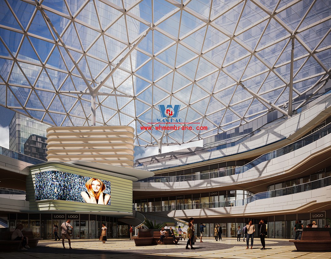 Recently, Shaoxing Huafa Financial Vitality City ETFE membrane structure commercial canopy ushered in new progress.  Shaoxing Huafa Financial Vitality City is located in Jinghu New District, Yuecheng District, Shaoxing City, 7.5km away from Shaoxing City Center, east to Xingzhong Road, west to Wenxian Road, south to Qunxian Road, north to Kwun Tong Road West. Huafa Financial Vitality City is the first commercial flagship brand of Guomai Huafa into Zhejiang, based on the history and future of Shaoxing, located in Jinghu high-end core, to create a construction surface of about 70,000 square meters of MALL BLOCK commercial street combination of urban creative consumption space. The vertical support system of the main steel structure of the canopy is a tree structure, the horizontal support system is a double-curved box lattice shell structure, and the steel columns and diagonal braces are all hoisted in a single hoisting mode. The roof lattice shell is assembled in blocks by automobile crane on the ground, and the crawler crane is hoisted in blocks. Finally, it is covered with ETFE film (soft glass). Make the whole commercial street more transparent and bright, dazzling.   The steel structure installation and splicing work is being carried out at the site. Due to the narrow space, the steel structure hoisting operation radius is large, and the on-site welding amount is large, and the recent attacks of high temperature and heavy rain have brought many tests to the project. According to the actual working conditions on the site, Marriott disassembled the steel structure hoisting section and calculated the hoisting equipment; And according to the actual situation of the project to organize relevant technical personnel to carry out targeted learning and understanding, multiple training. Establish BIM model to guide factory processing and on-site installation, adopt high-precision laser cutting, organize processing personnel and construction personnel to disclose information in special meetings, fully understand drawings and models, and provide a strong guarantee for project construction. Engineering quality is the control focus of each project, and this project is included in the company's key control projects. Throughout the construction process of the project, Marriott has always focused on this quality goal, increased human and material input, strengthened management, carried forward the company's key projects, and done a good job in the spirit of each project, implementing quality target management. In order to achieve the goal, Marriott has implemented the target value to each team according to the project, the responsibility to the person, and the site construction is meticulous. In order to ensure the smooth progress of the project, the construction staff of Marriott planned for the rainy day, inverted the schedule, thorough deployment, coordinated the allocation of resources from various parties, coordinated the allocation of personnel, materials and machines, communicated the operation technology and safety technology of the operation team in advance, and assembled, tested, accepted and obtained evidence of the steel structure mesh shell. During the construction process, in the face of hot and rainy summer weather, the engineering Department does a good job of heat prevention and flood control measures to ensure the safety of construction personnel, and fully promote the construction progress, all the construction personnel fight sunny days, grab rainy days, under the premise of ensuring safety and quality, and constantly promote the progress of steel structure assembly, creating conditions for the installation of membrane structure in the later period.   The smooth progress of the project laid a solid foundation for the completion of the 