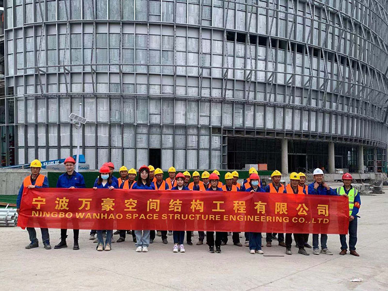 The employees of Wanhao Space Structure went to Shaoxing International Convention and Exhibition Center PTFE Facade Mesh Membrane Project to learn and exchange