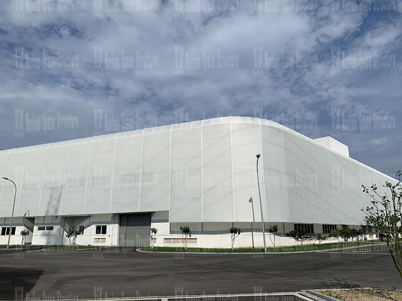 The PTFE mesh membrane structure project on the facade of the new factory building of Ningbo Yifuler Company is coming to an end
