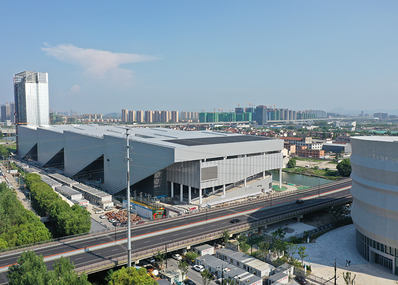 International Convention and Exhibition Center Exhibition Hall Curtain Wall PTFE Mesh Membrane Structure Project with 2300 square meters of  ptfe mesh project construction by WANHAO.