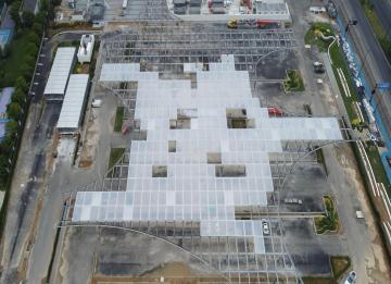 Withstanding the powerful typhoon test, the Taizhou Sam's Club ETFE air pillow canopy remains unscathed, and construction progresses steadily.